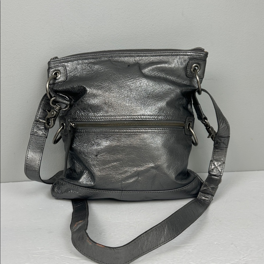 The SAK Silver Metallic Pebbled Leather Convertible Crossbody Bag